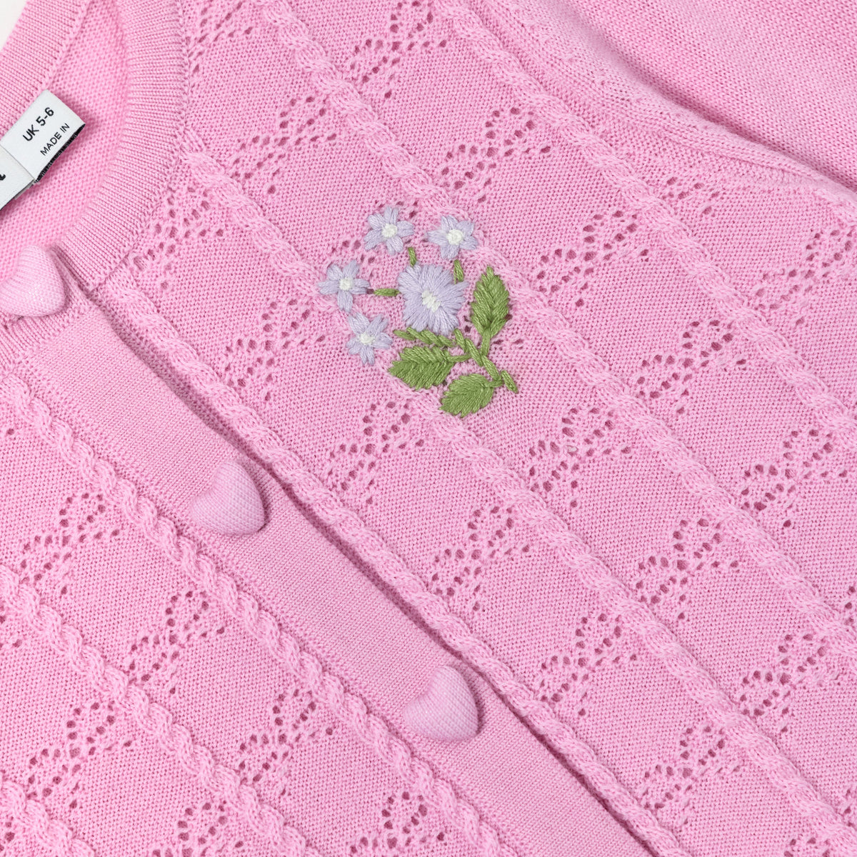 Pembe Çiçek Detaylı Ajurlu Örme Çocuk Hırka