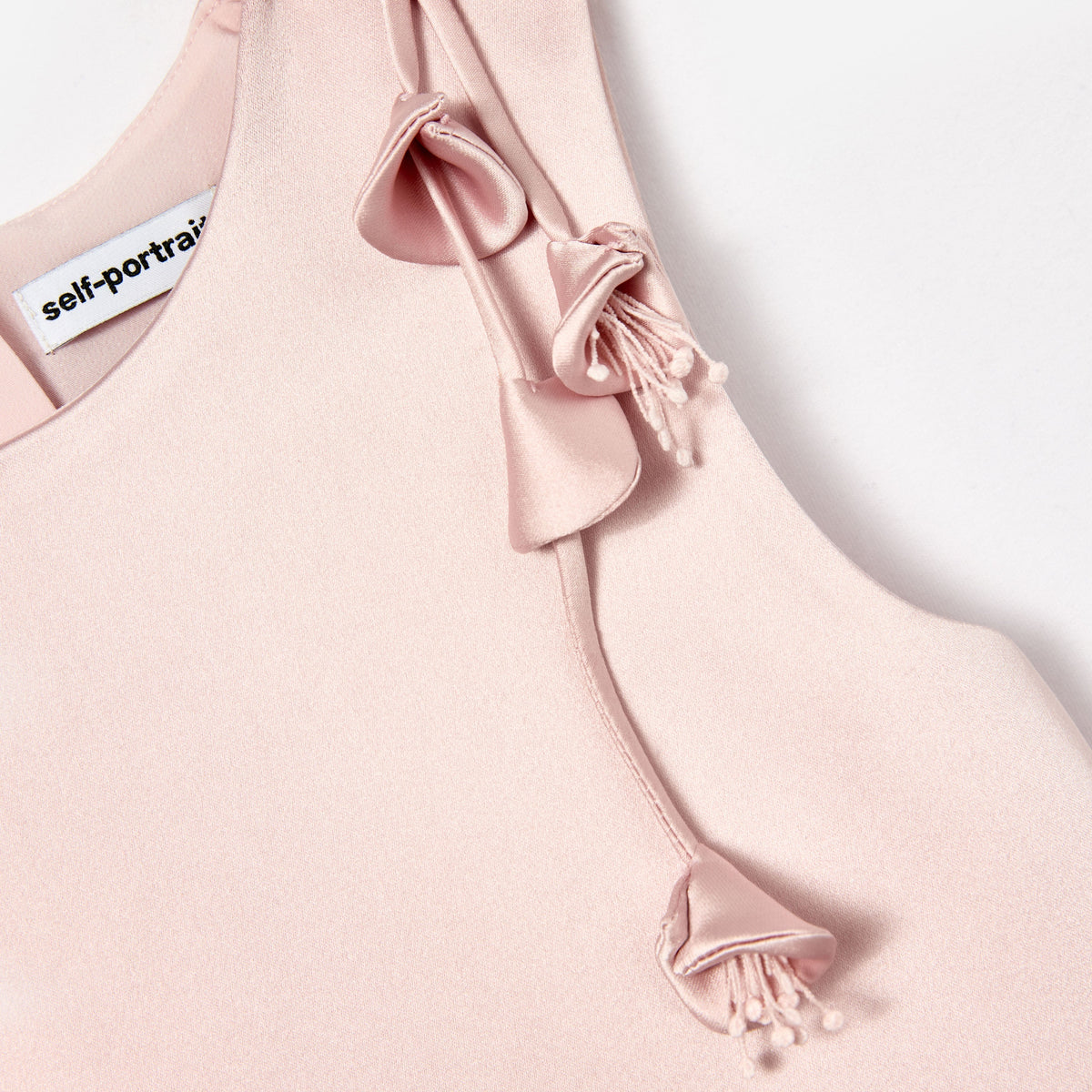 Pembe Çiçek Motif Detaylı Saten Kolsuz Çocuk Elbise